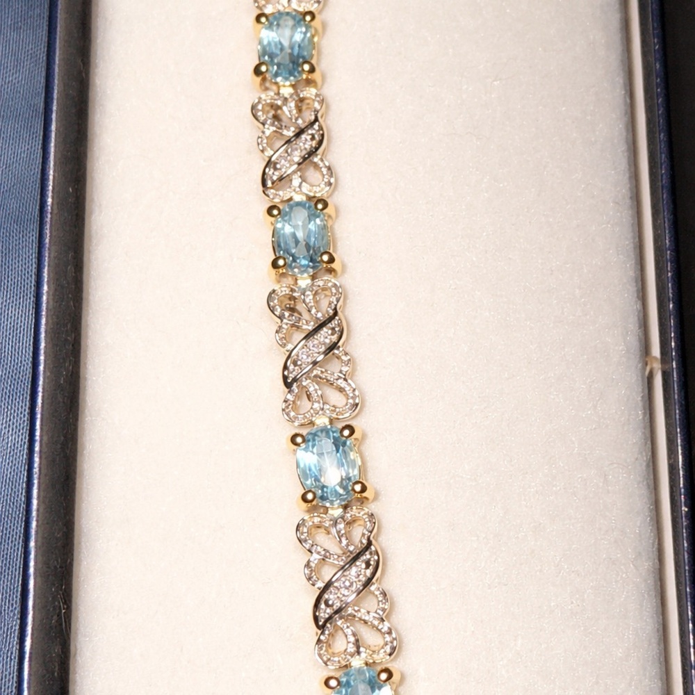 14k White Gold Blue Topaz tennis bracelet